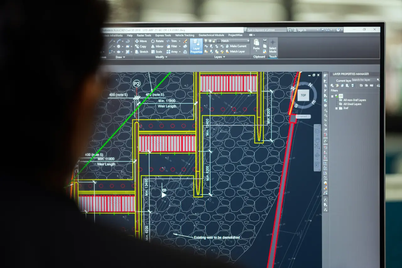 Engineer reviewing electrical drawings